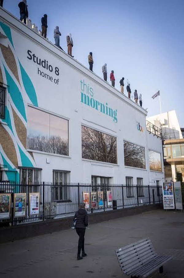 Figures on the roof of Studio 8, the This Morning building
